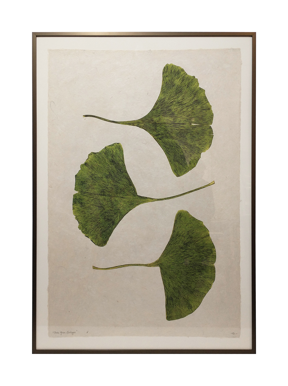 art print of yellow ginkgo leaves in a green frame